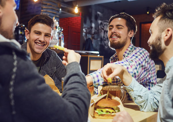 friends having fun and food at the pub